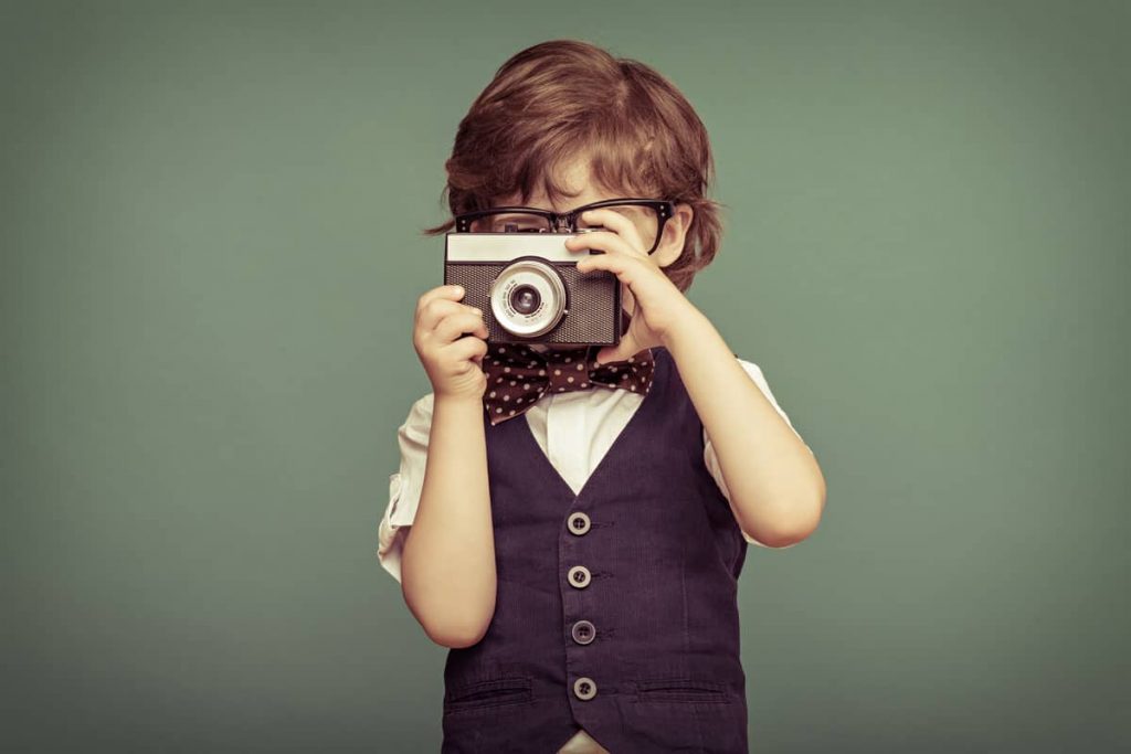 school photographer child with camera