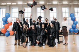 Graduates tossing caps