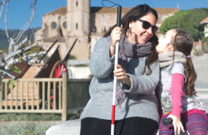 photo of blind woman with her daughter