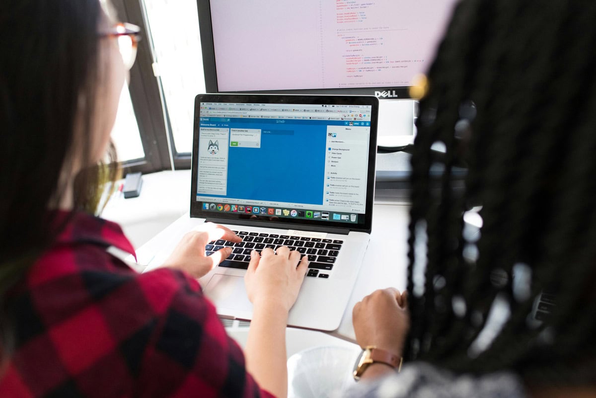 Women working on website together