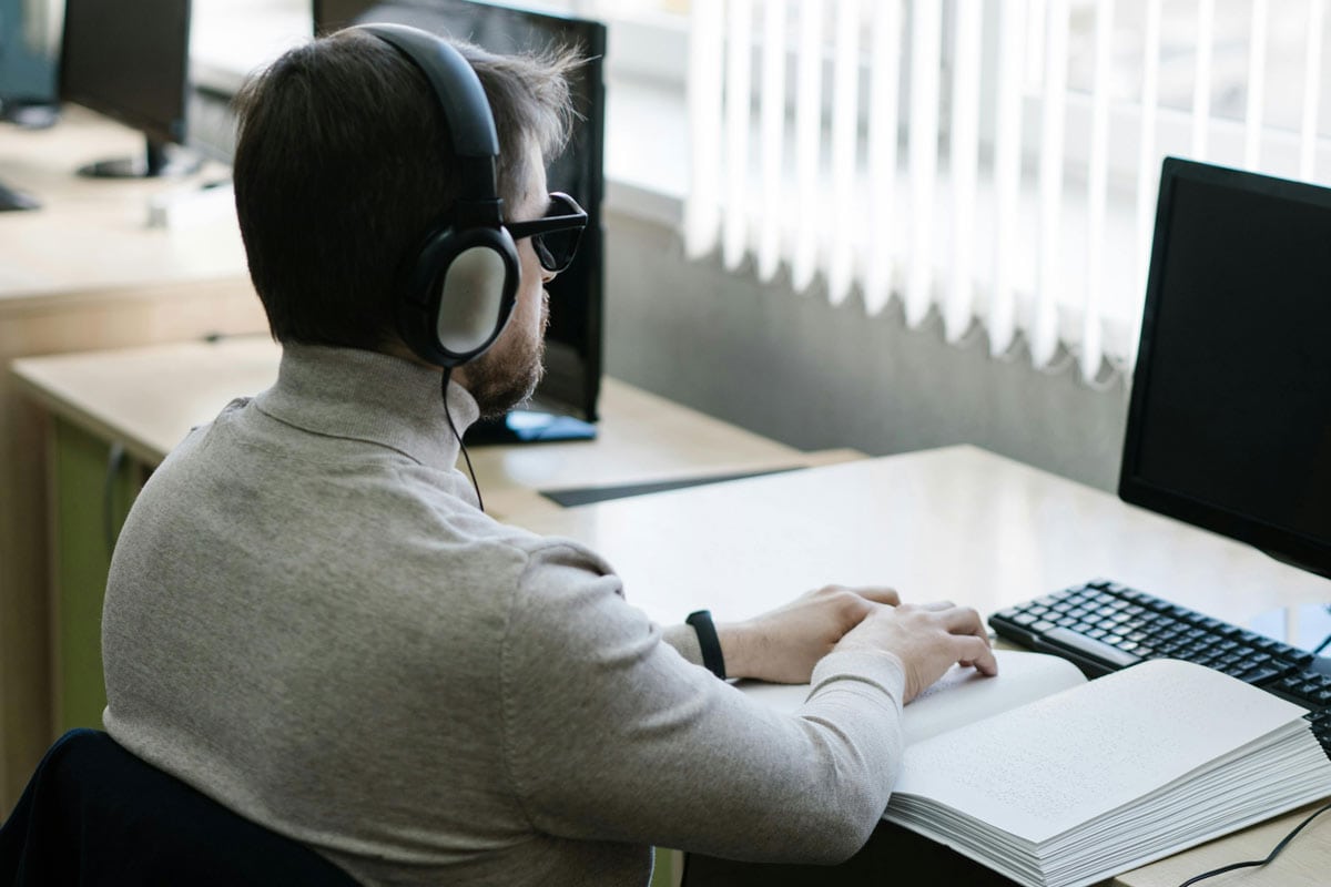 Blind man using a computer